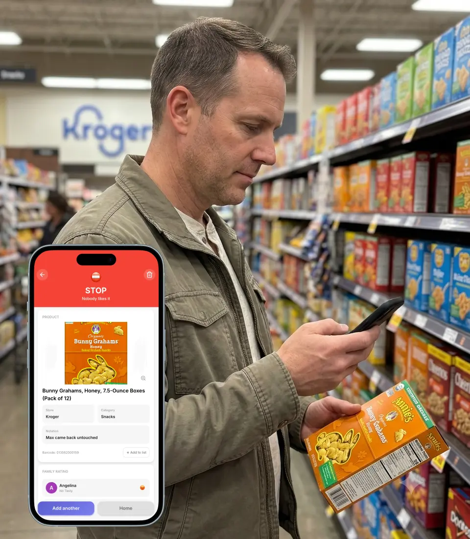 Dad in Kroger snack aisle holding Annie's Bunny Grahams in one hand, checking his phone with Favory showing STOP rating and notation 'Max came back untouched'