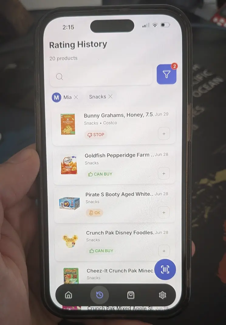 Favory app Rating History screen filtered by Mia showing Annie's Bunny Grahams as STOP and Goldfish as CAN BUY